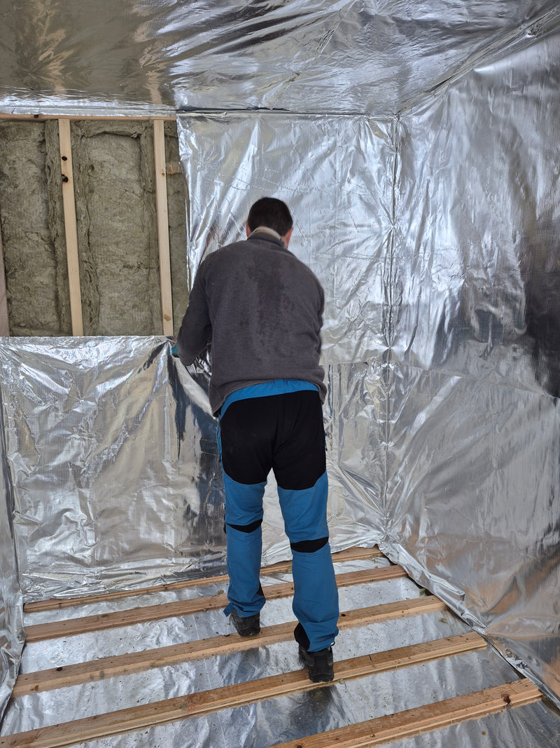 Insulation being Installed in Mobile Sauna